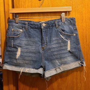 Lightly distressed blue denim shorts size large